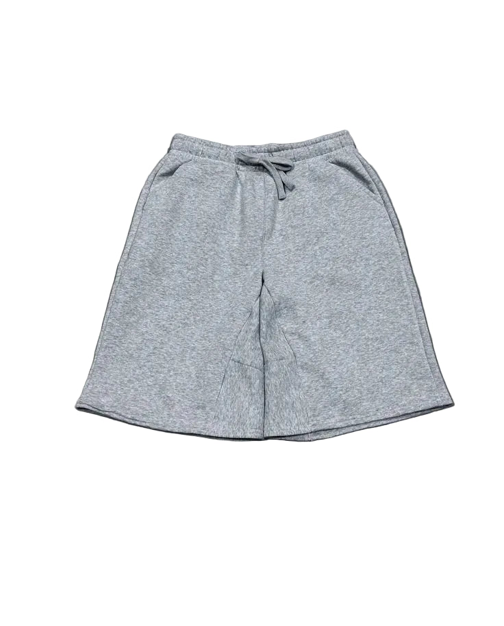 Gray shorts on a gray concrete surface